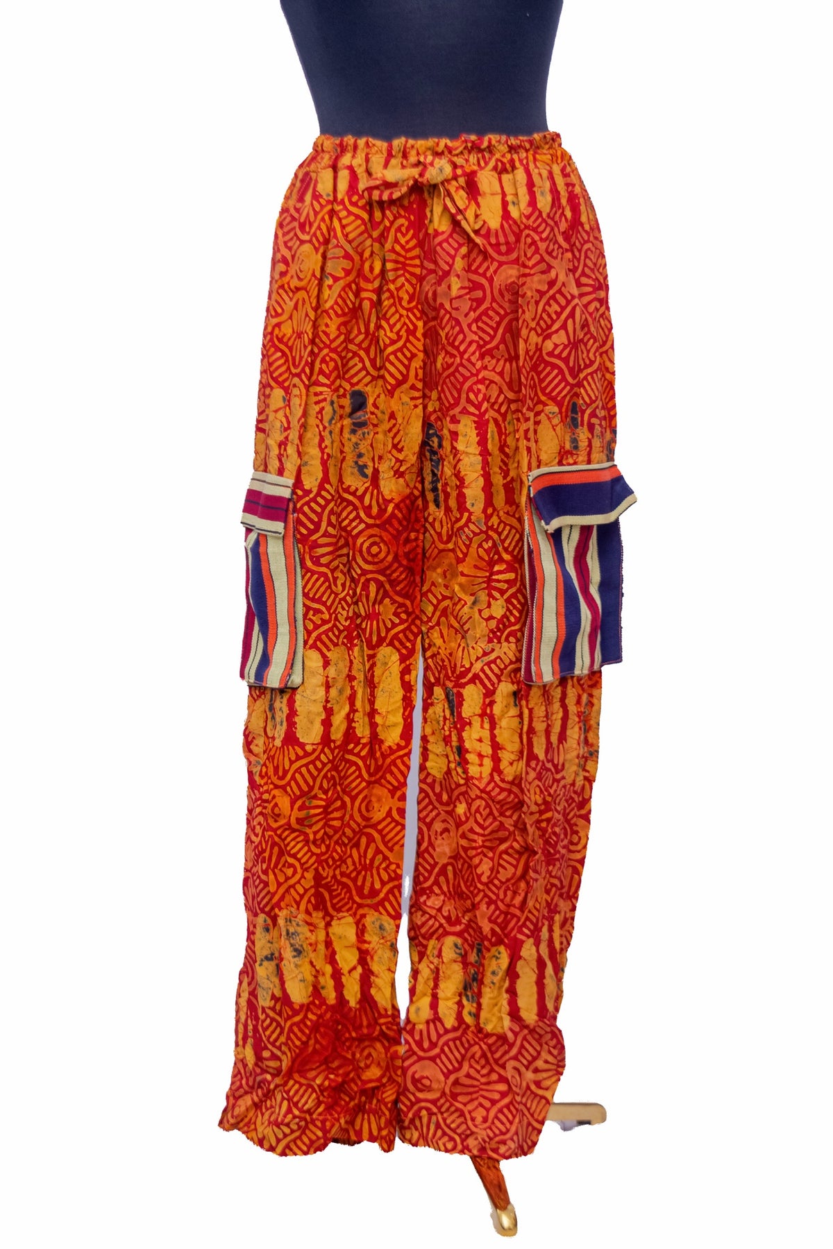 African Batik Wide-Leg Trousers — Red & Orange Hand Print with Woven Pocket Flaps