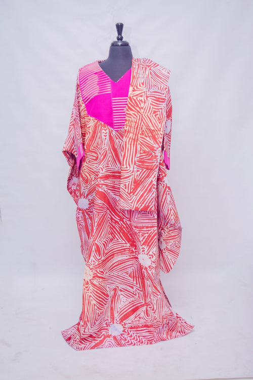 African Batik Oversized Kaftan — Coral Triangle Maze Print with Hot Pink V-Yoke, angled view
