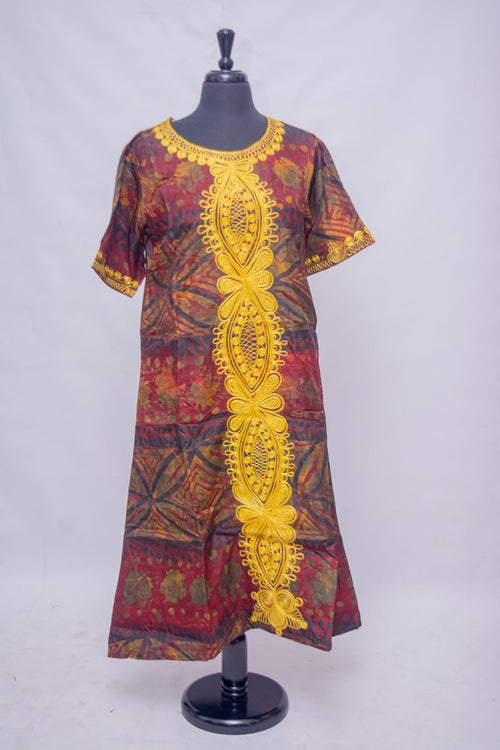African Batik Shift Dress — Burgundy Starburst Print with Gold Guipure Lace Medallion Panel, front view