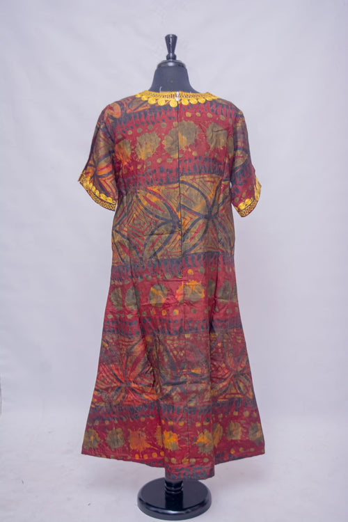 African Batik Shift Dress — Burgundy Starburst Print with Gold Guipure Lace Medallion Panel, back view