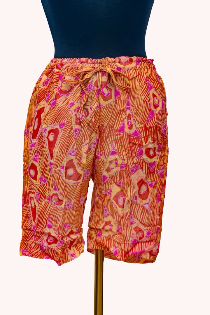 African Batik Drawstring Shorts — Sunset Orange & Pink Triangle Print
