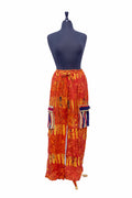 African Batik Wide-Leg Trousers — Red & Orange Hand Print with Woven Pocket Flaps