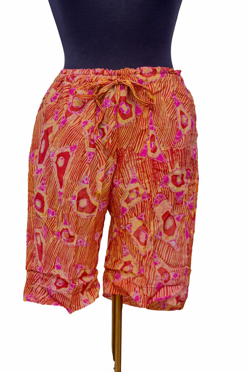 African Batik Drawstring Shorts — Sunset Orange & Pink Triangle Print
